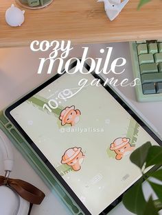 an image of a computer game on the desk with headphones and keyboard in background