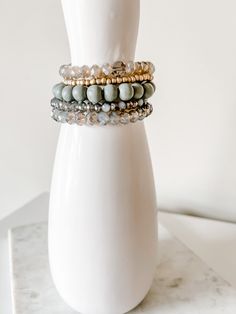 Add some sparkle to your wrist with this stunning Ziona bracelet stack. All bracelets in this stack are made to stretch for easy wear and comfort with the most subtle hint of glimmer. This go-to stack can be worn on its own or stacked with other delicate wristwear for a layered look. THIS ITEM IS FINAL SALE. NO EXCHANGES OR REFUNDS. Details 4 Stack Stretch Bracelets 7” diameter Hypoallergenic All jewelry comes with Harper & Teal engraved canvas pouches to protect the longevity of your purchase Shipping/Returns Shipping We offer free standard shipping on all orders shipped within the United States. There are no minimum purchase price requirements for free shipping. Please select "FREE SHIPPING" at checkout. For more info, visit "Is Free Shipping Offered?" under our FAQs page. Casual Everyday Stacked Stretch Bracelet, Casual Stacked Adjustable Stretch Bracelet, Adjustable White Stacked Stretch Bracelet, Bohemian Stretch Stackable Bracelet, Casual Everyday Stretch Bracelet, Stackable, Canvas Pouch, Bracelet Stack, Layered Look, Stretch Bracelets