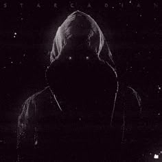black and white photo of person in hoodie looking at night sky with stars on it