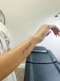a woman's arm with a tattoo that reads, i love you forever on it
