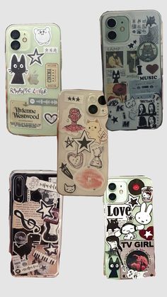 four cell phones with stickers on them in different shapes and sizes, all lined up against one another