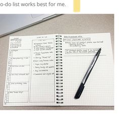 a notepad and pen sitting on top of a notebook