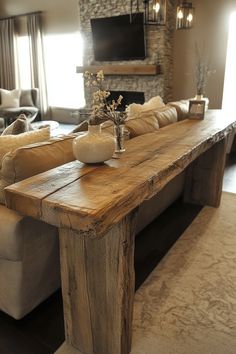 bar table behind couch in 2025 | Table behind couch, Bar table behind couch, Rustic sofa tables