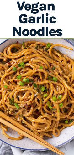 Vegan garlic noodles in a bowl with chop sticks.