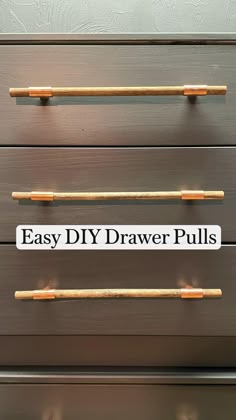 an easy diy drawer pulls sign is displayed on the drawers in front of it