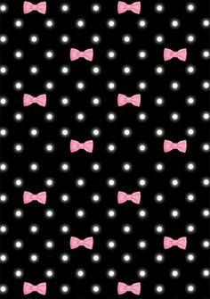 a black background with pink bow ties on it's side and white dots in the middle