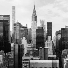 black and white photograph of new york city skyline with chrysler building in the foreground
