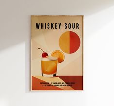 an old fashioned whiskey sour poster hangs on the wall