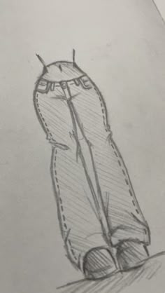 a drawing of a cat sitting on top of a table next to a piece of paper