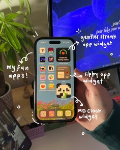 a person holding an iphone in front of a computer screen with text describing how to use it