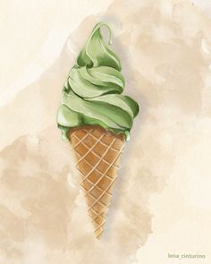 an ice cream cone with green icing on it's tip, sitting on a beige background