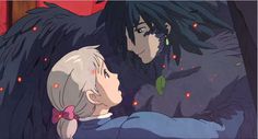 two anime characters in the dark with their heads touching each other's foreheads