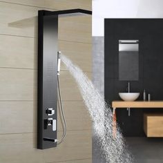 a shower head with water coming out of it
