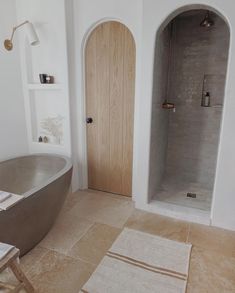 Arched Tiled Bathroom with Vintage Kilim Rug