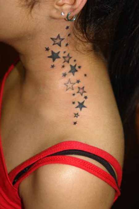 a woman's neck with stars on it