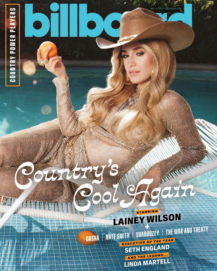 the cover of billboard magazine featuring an image of a woman in a cowboy hat sitting on a chair