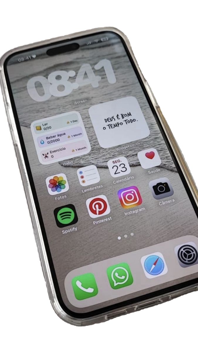 an iphone is shown with icons displayed on the screen and in front of it's display