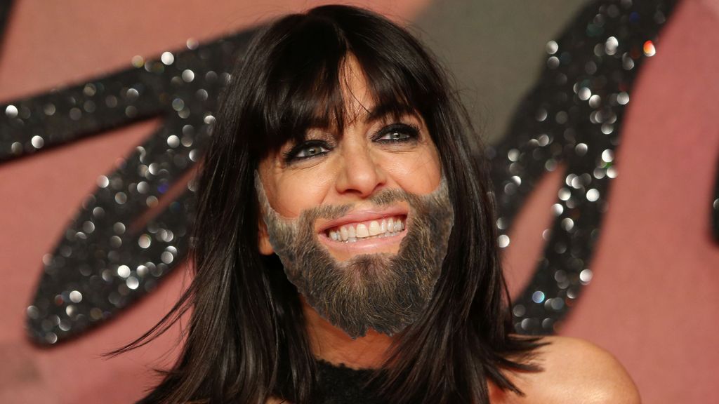 Female presenter with full beard.
