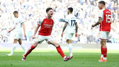 Arsenal's Declan Rice celebrates victory over Tottenham
