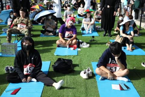People take part in Seoul's "space-out" competition in a park in South Korea.