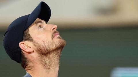 Andy Murray looks up towards the sky