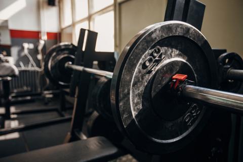 A stock image of barbells in a gym