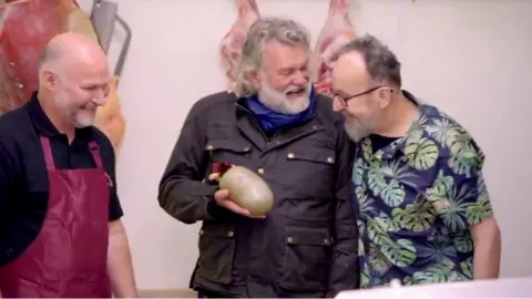 Hairy Bikers Dave Myers and Si King hug each other