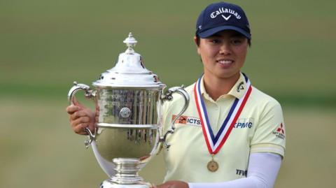 Yuka Saso with the US Women's Open trophy in 2024