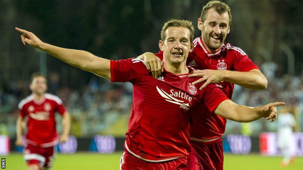 Peter Pawlett (left) put Aberdeen two ahead with a second half diving header