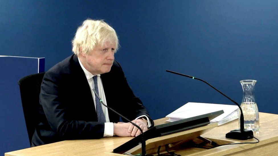 Former Prime Minister Boris Johnson gives evidence at the COVID-19 Inquiry, in London,