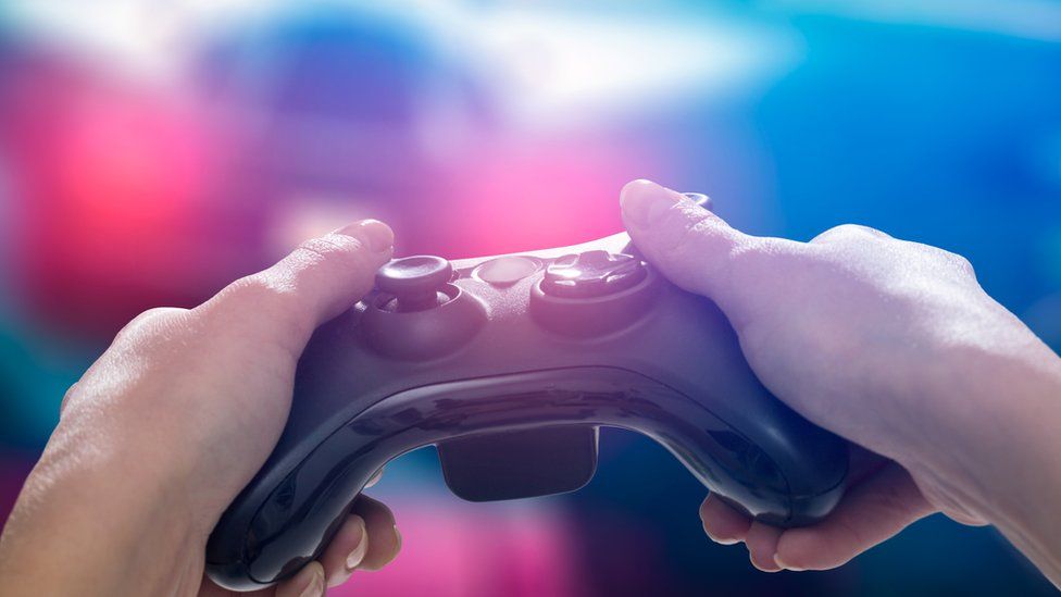Picture of hands on a controller
