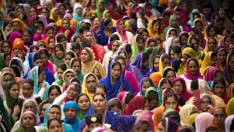 Women watching a Vaisakhi procession