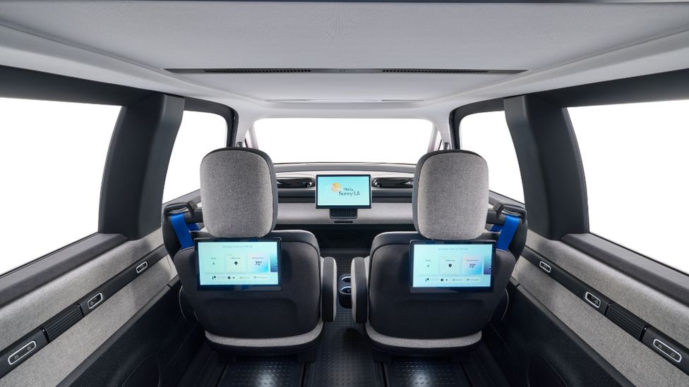 Back of seats with screens in a driverless taxi van