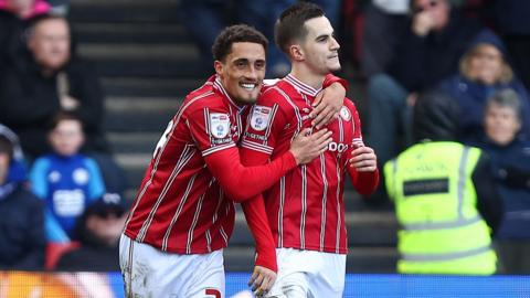 Anis Mehmeti of Bristol City celebrates scoring their sides first goal of the game to make it 1-0 with Haydon Roberts