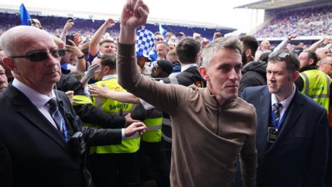 Ipswich boss Kieran McKenna celebrates promotion after the final whistle in their last game of the season