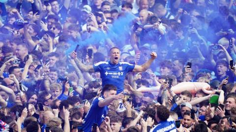 Fans celebratory after Ipswich Town is promoted to the Premier League