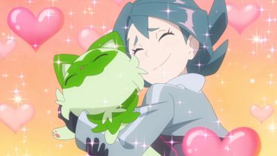 A girl hugs a green cat pokemon with hearts appearing around her