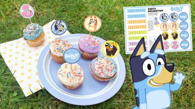 Illustration of Bluey character waving. Print out showing cupcake decorations. Real image showing picnic with cupcakes using bluey decorations.