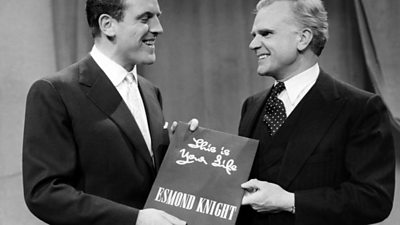 Black and white picture shows Eamonn Andrews and Esmond Knight with the book of the programme after 'This is Your Life' on 18.02.57.