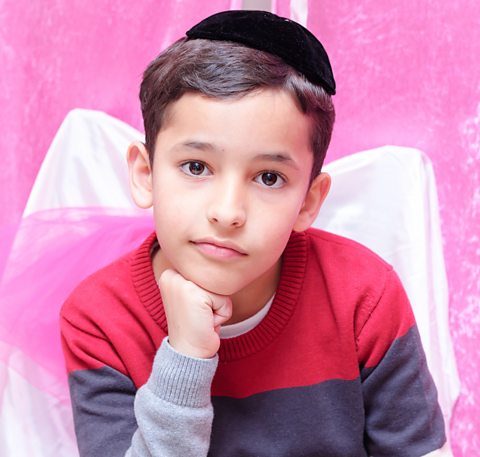 A Jewish boy wearing a kippah.