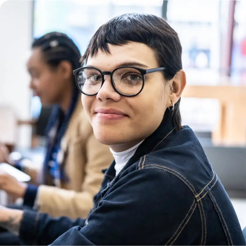 woman smiling wearing glasses