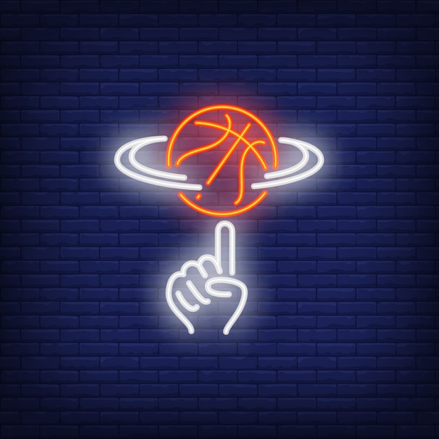 Vecteur gratuit basketball tournant sur le signe néon de doigt