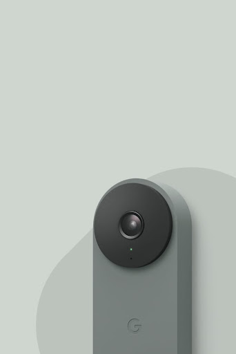 An Ivy-colored Nest Doorbell (wired) with the status indicator light on