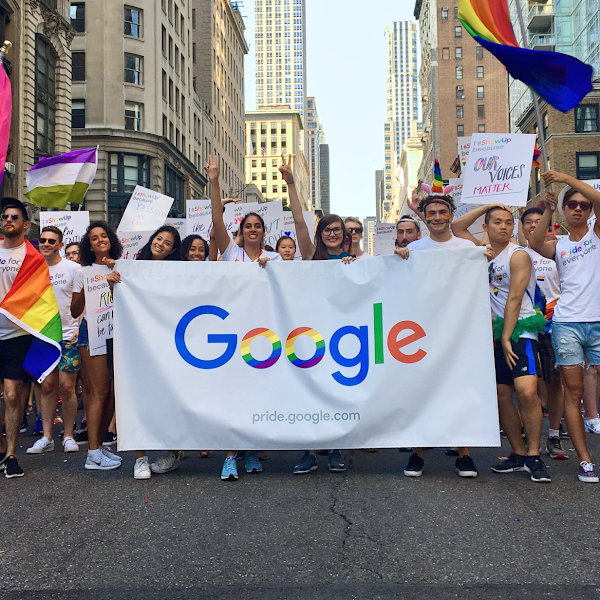 Googlers march together in a Pride parade