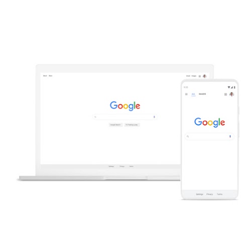 A laptop and phone featuring Google Search