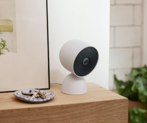 Nest Cam on optional stand with home decor.