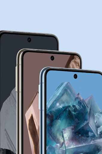Three Pixel 8 Pros in various colors. They stand behind one another. Their homescreens are on, showing off the smooth, scratch-resistant glass.