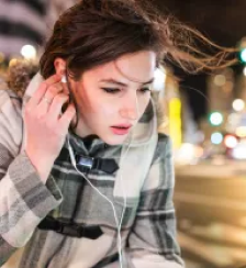 Image of girl sitting with headphones