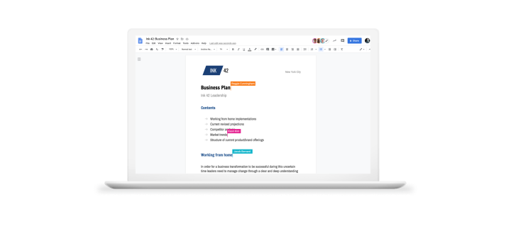 Laptop showing Google Docs interface.