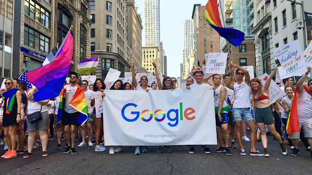 Googlers march together in a Pride parade